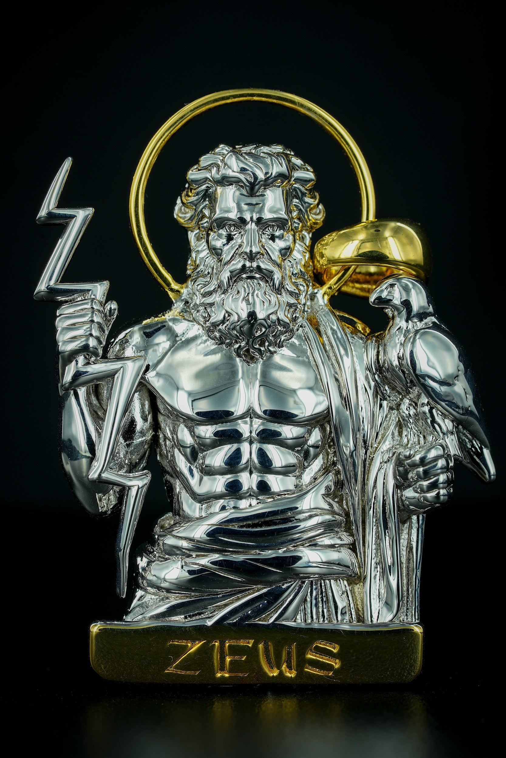 Close-up of Greek god Zeus necklace showing engraving and shine – Blesd Jewelry